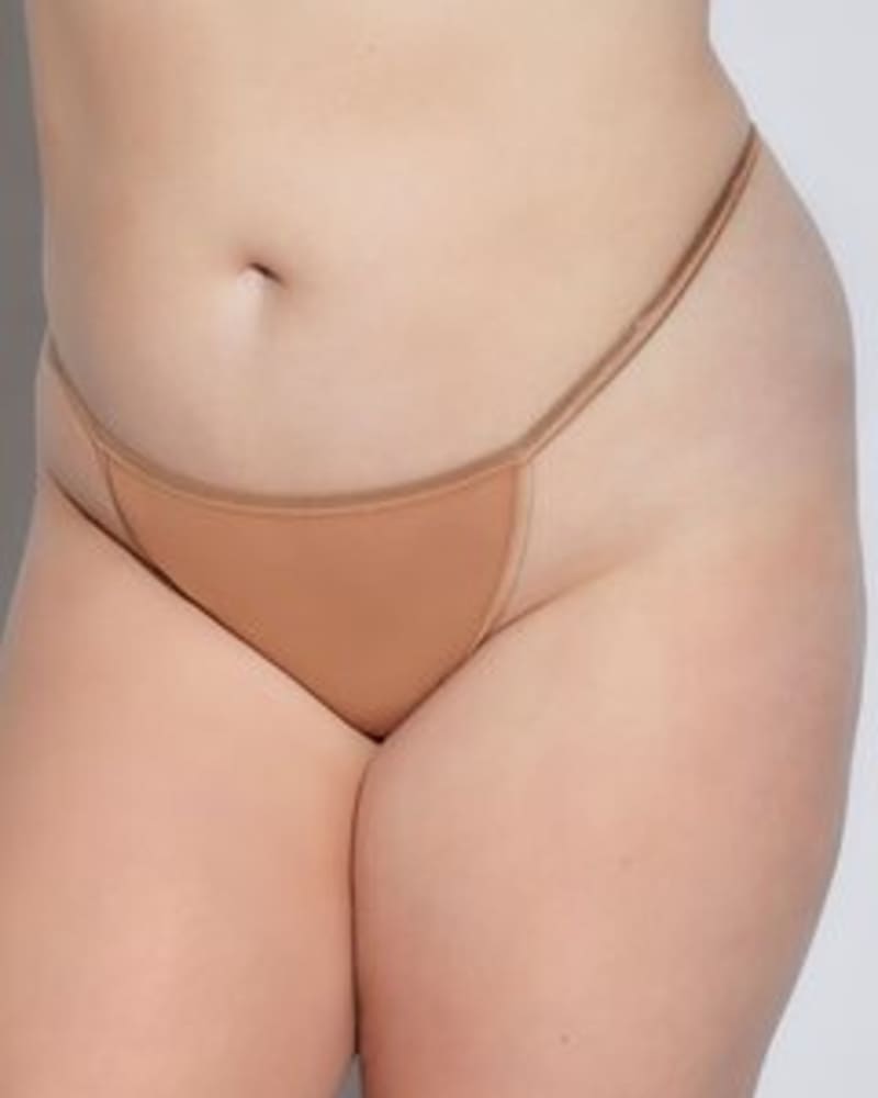 Front of a model wearing a size 1X/2X Low-Rise Mesh G-String in Quattro by Cosabella. | dia_product_style_image_id:253697